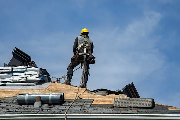 Professional Roofing technician working in Kirkman, IA